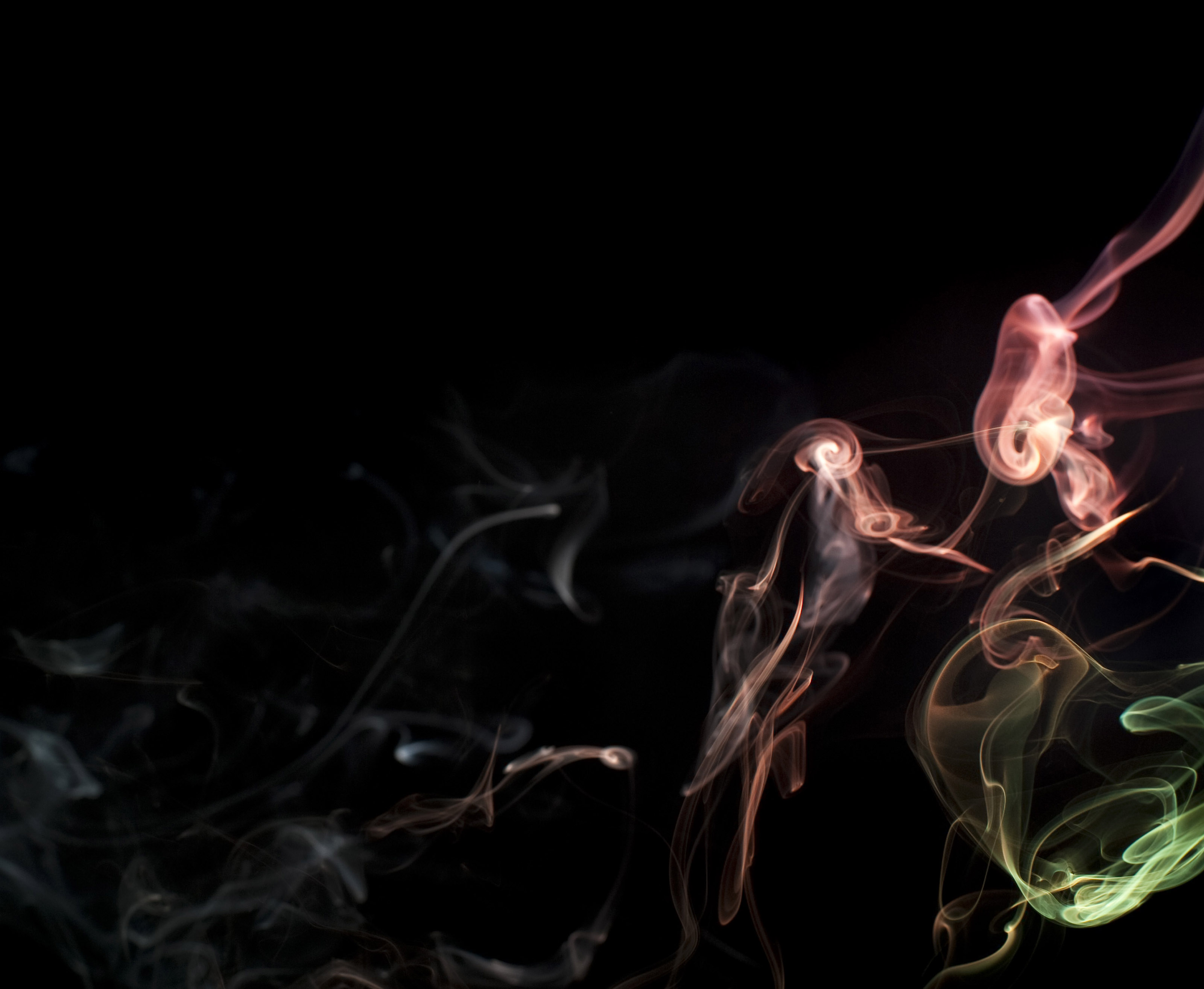 colored weed smoke black background