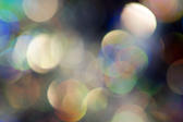 a dreamy abstract hazy light backgrop created with lens bokeh and chromatic aberration image