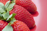 stock image Close up of fresh ripe strawberries for dessert on a pink background