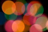 colourful and dreamy light effect created using christmas lights and 50mm prime lens