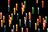 colourful seasonal background of motion blurred christmas lights