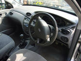 looking into a car interior, steering wheel and instrument cluster, right hand drive car