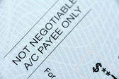 Printed bank cheque - Account Payee only, Not negotiable - crossing to ensure that it is paid into the account of the nominated person and not cashed or endorsed to a third party