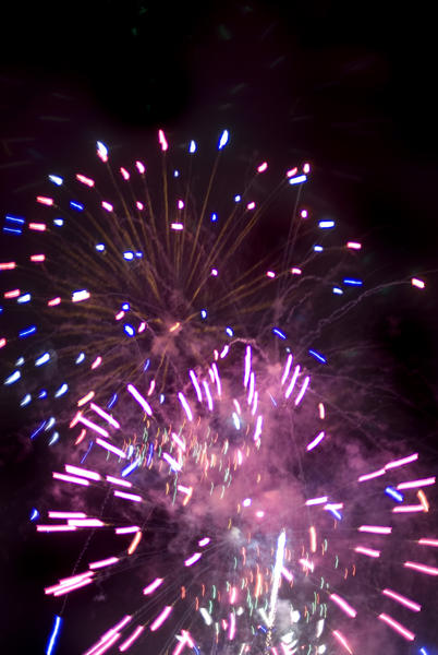 a display of pink / purple fireworks perhaps suitable to illustrate a valentine design
