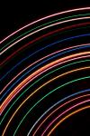 curved concentric lines of vivid coloured light